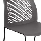 Chaise empilable capacité 300 kg avec dossier aéré et piétement luge thermolaqué